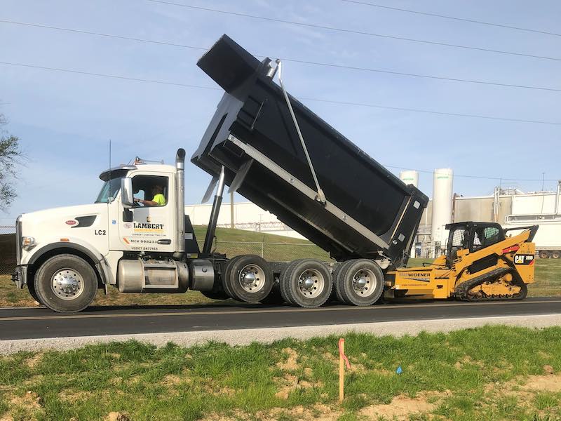 dump truck Concrete General Contractor in Hollywood, AL | Lambert Contracting, LLC